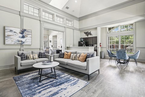 clubhouse with couches at Jefferson Creek in Irving, TX